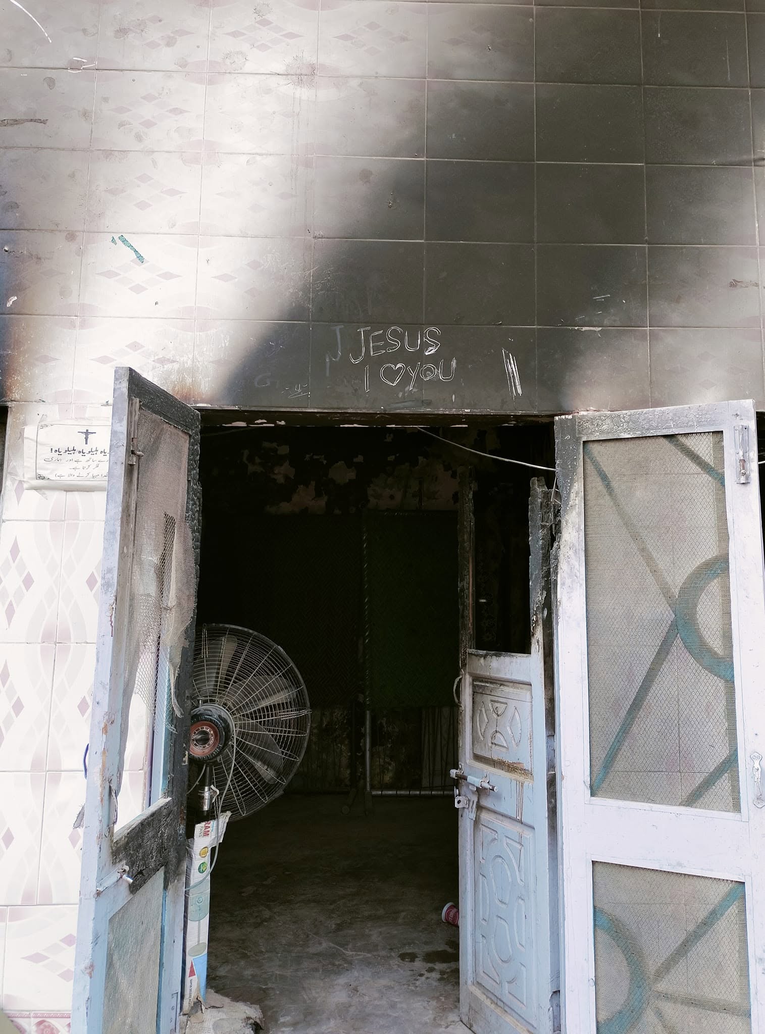 The charred entrance of a Christian home in Jaranwala, Pakistan, is pictured in October 2023, two months after anti-Christian riots swept the town in August 2023. | Credit: James Rehmat