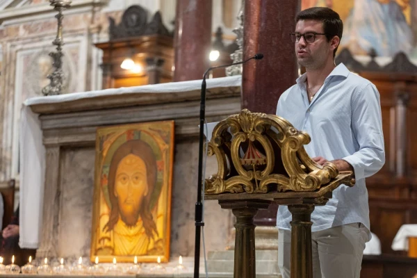 A young Catholic reads the "Manifesto of the Young Christians of Europe" aloud at St. Mary’s Basilica  in Trastevere, Aug. 1, 2025. Credit: Daniel Ibáñez/CNA