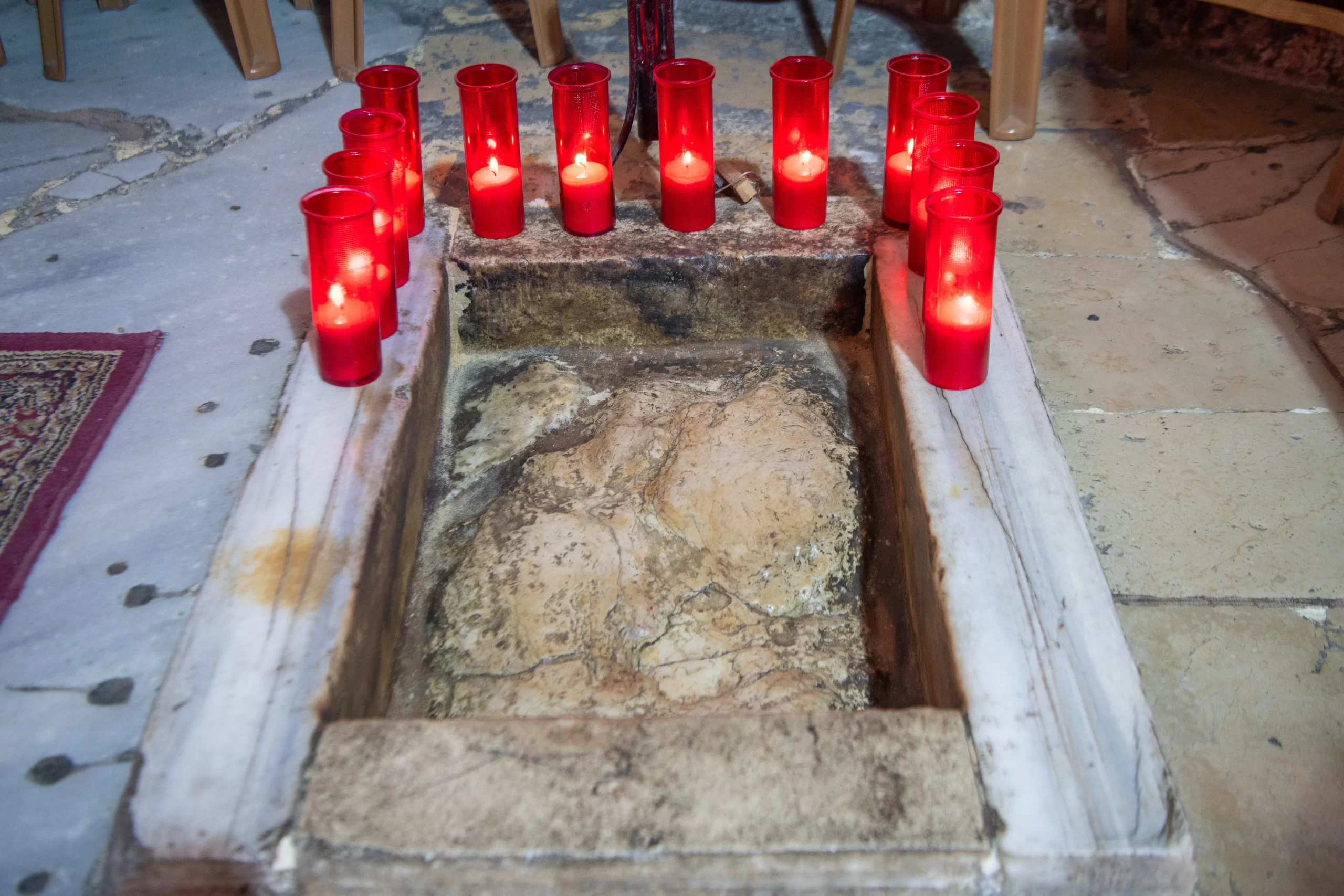 The rock venerated inside the Chapel of the Ascension, on the Mount of Olives, in Jerusalem. According to tradition, the last earthly footprint of Jesus before ascending to Heaven is imprinted on this rock. Credit: Marinella Bandini