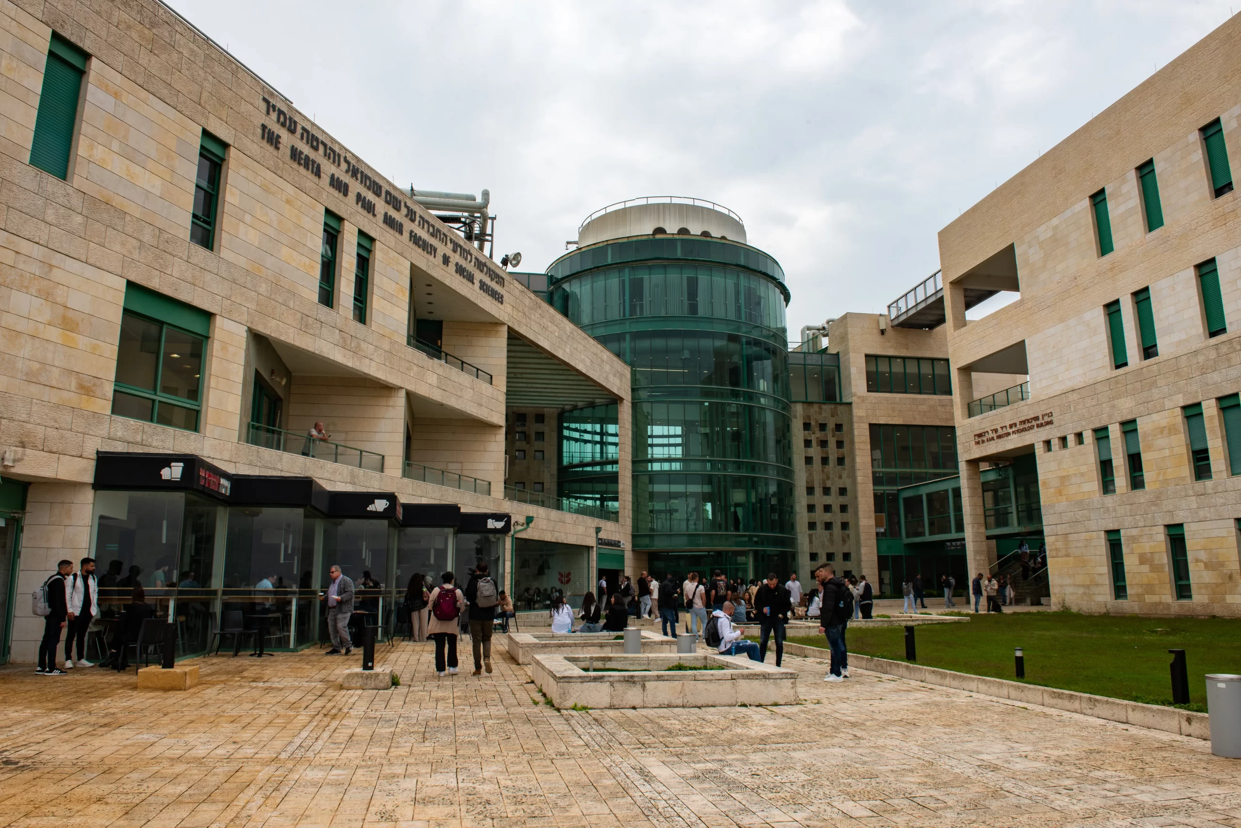 The headquarters of the Faculty of Social Sciences within the University of Haifa complex in April 2024. During class breaks, students gather at recreational areas. The University of Haifa is one of the most diverse and inclusive universities in Israel: 45% of the 17,000 students come from Arab society and 50% of all the students are first generation of higher education. Credit: Marinella Bandini