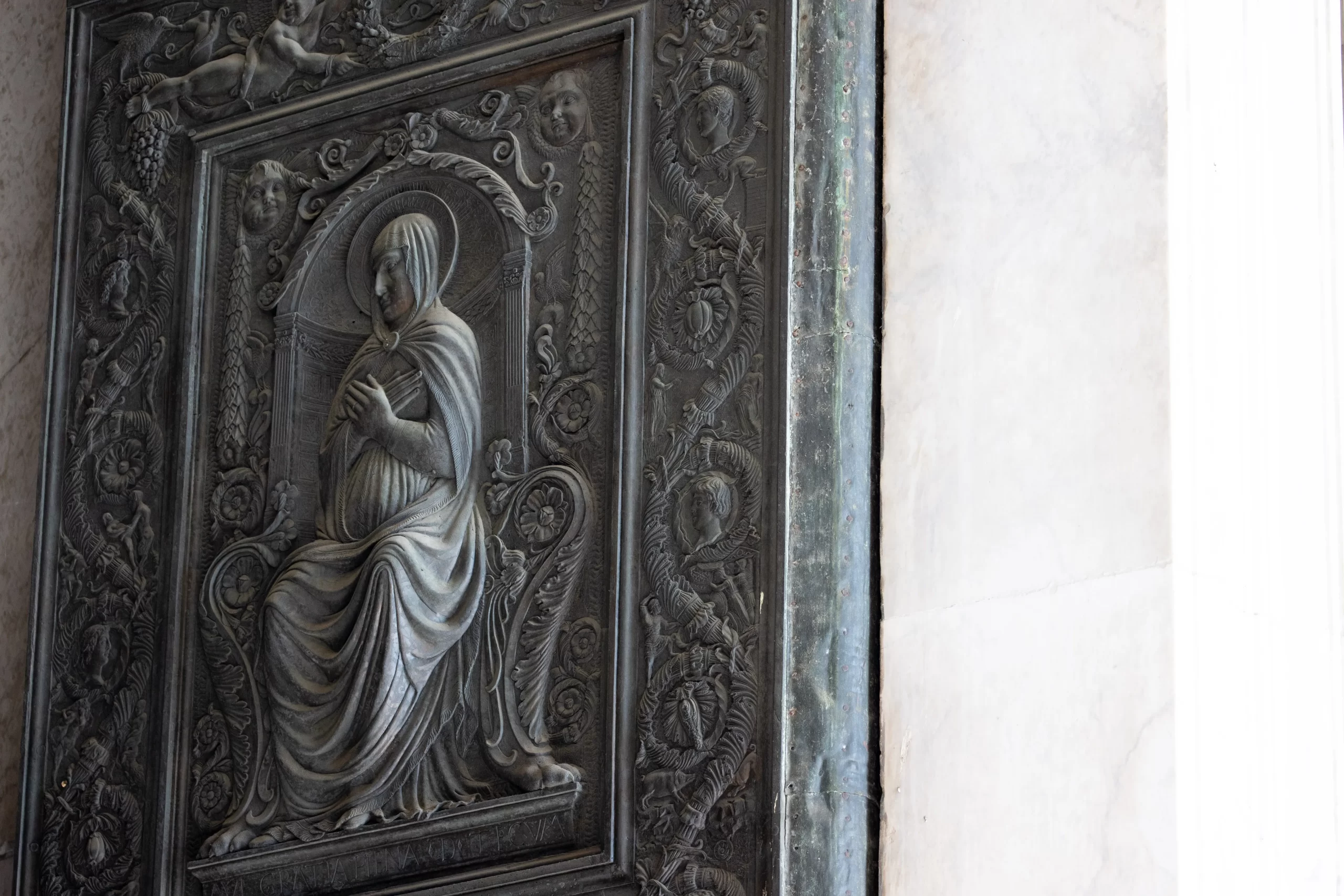 According to Father Agnello Stoia, the pastor of the parish of St. Peter’s Basilica, the 15th-century image of Mary on the oldest door of St. Peter’s Basilica is a reminder of Mary’s title, “Gate of Heaven.”. Daniel Ibañez/CNA