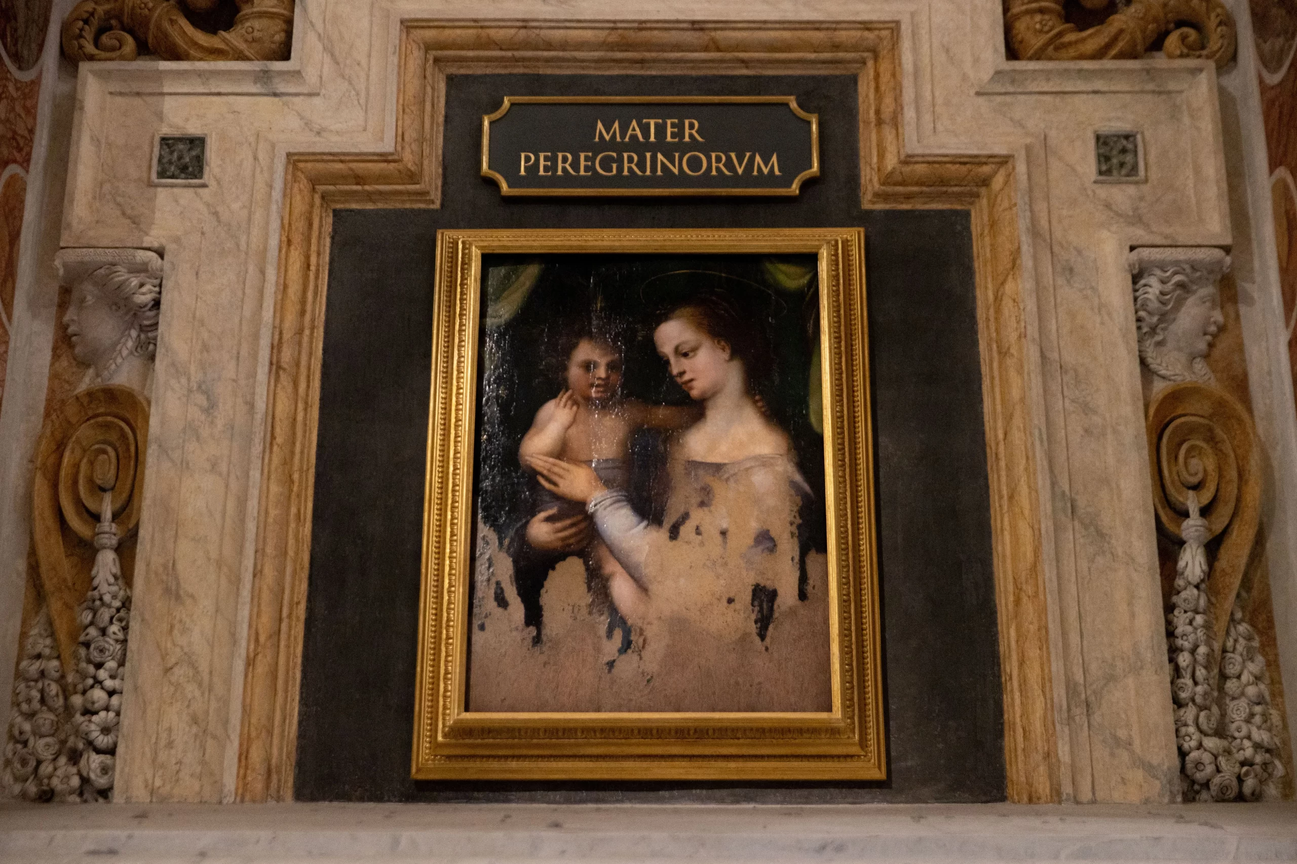 A restored 16th-century painting of Our Lady holding her Son can be found in St. Peter’s Basilica above the sarcophagus of Pope Gregory XIV under the title "Mother of Pilgrims.". Daniel Ibañez/CNA