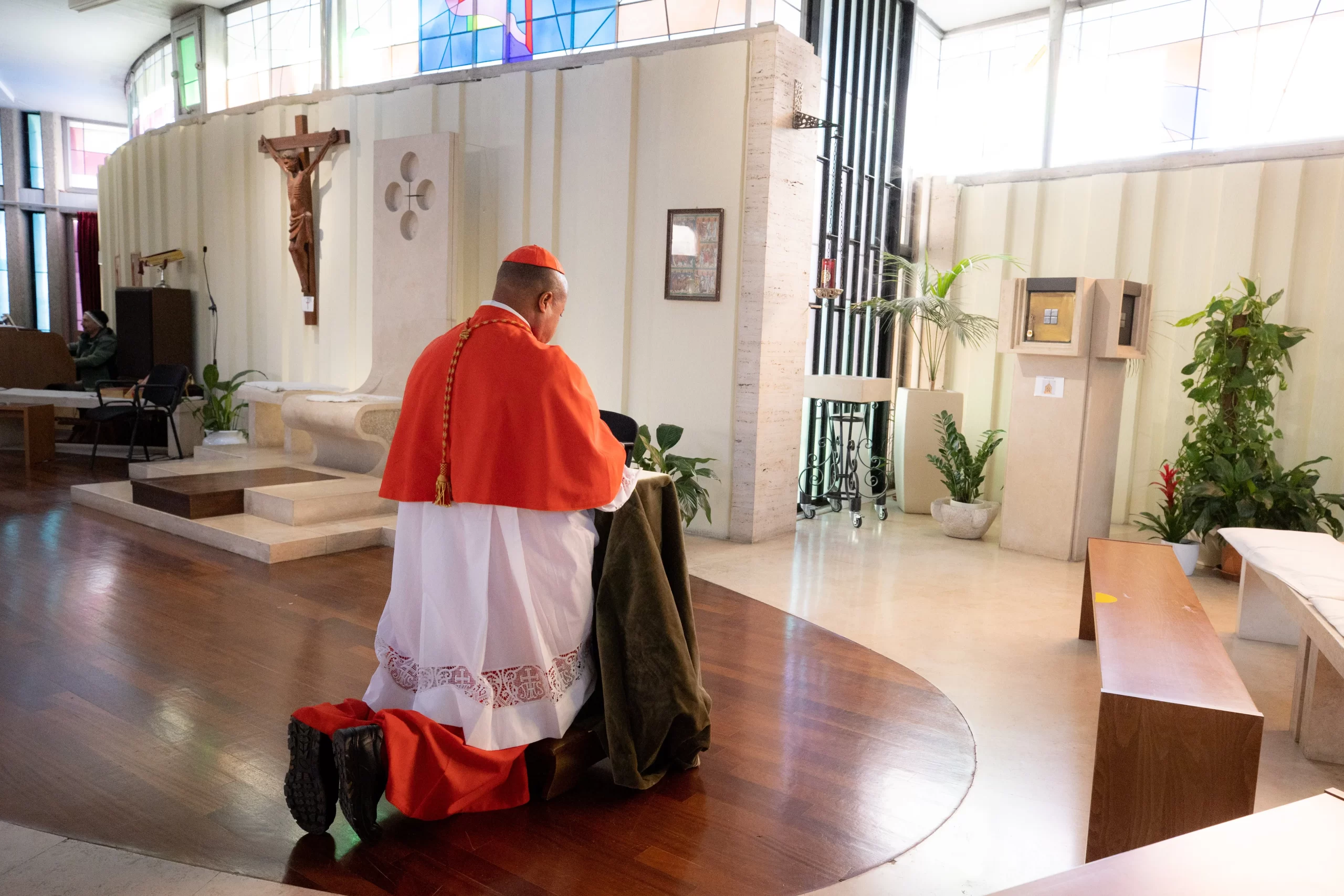 Cardinal Peter Ebere Okpaleke, bishop of the southern Nigerian diocese of Ekwulobia, prays as he takes possession of his titular church in Rome on Feb. 5, 2023. Credit: Daniel Ibanez/CNA