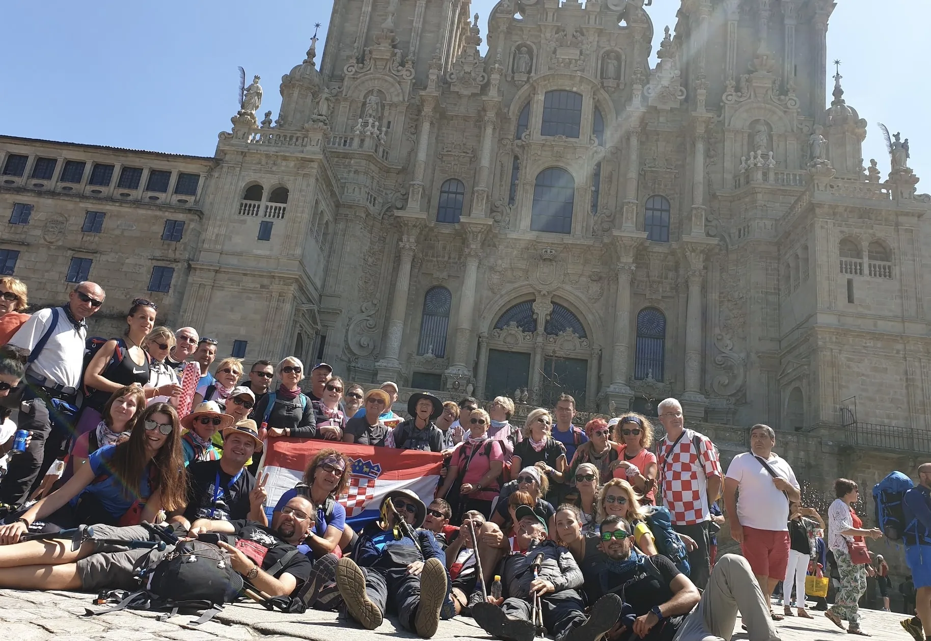 Group of Croatian pilgrims in front of the cathedral at Santiago de Compostela, Santiago de Compostela, Spain, August 2019. Photo credit: Confraternity of St. James - Croatia