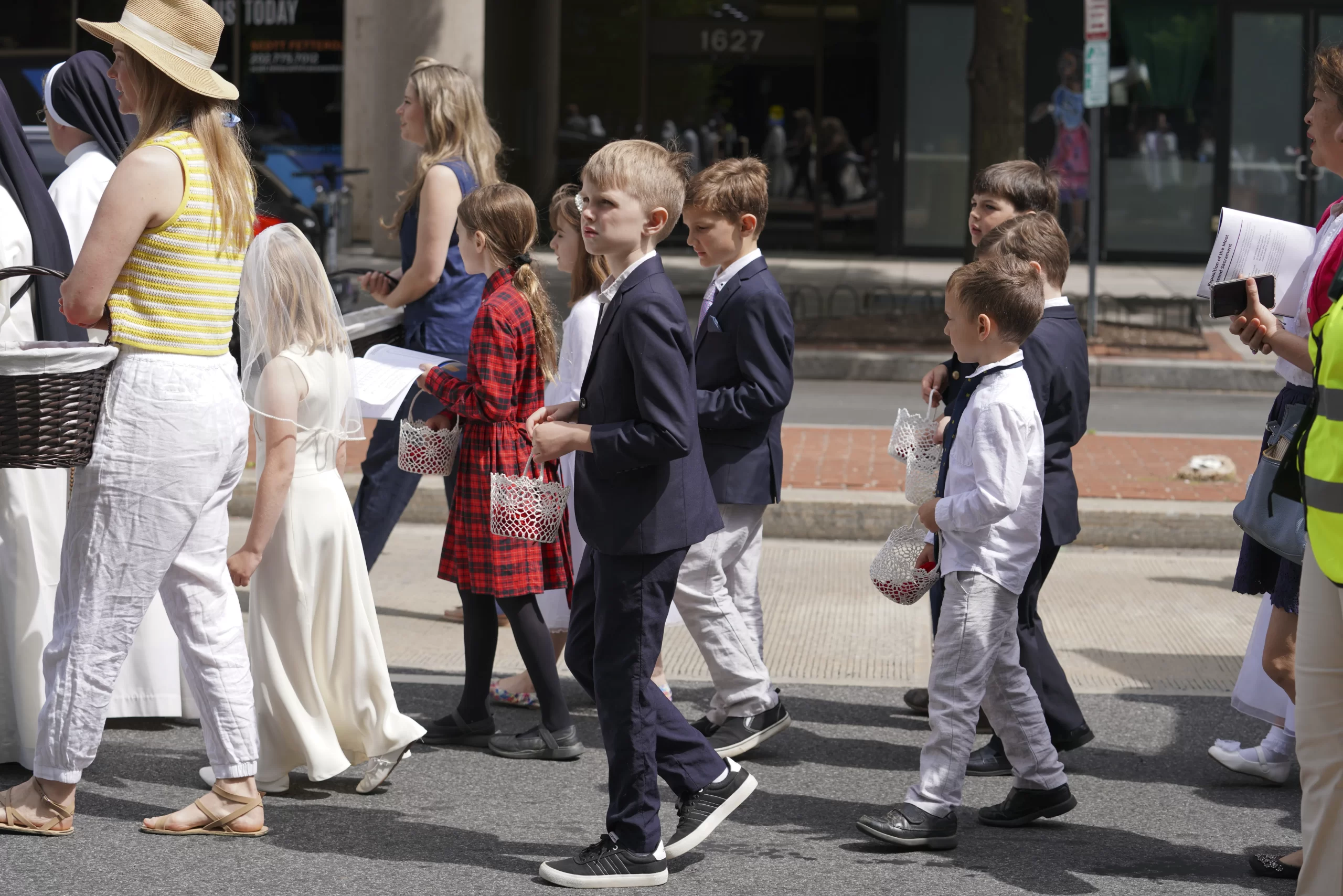 A few hundred Catholics marched through the streets of Washington, D.C., to publicly pray and adore the body of Christ during a eucharistic procession on Saturday, May 20, 2023. Credit: Joe Portolano/CNA