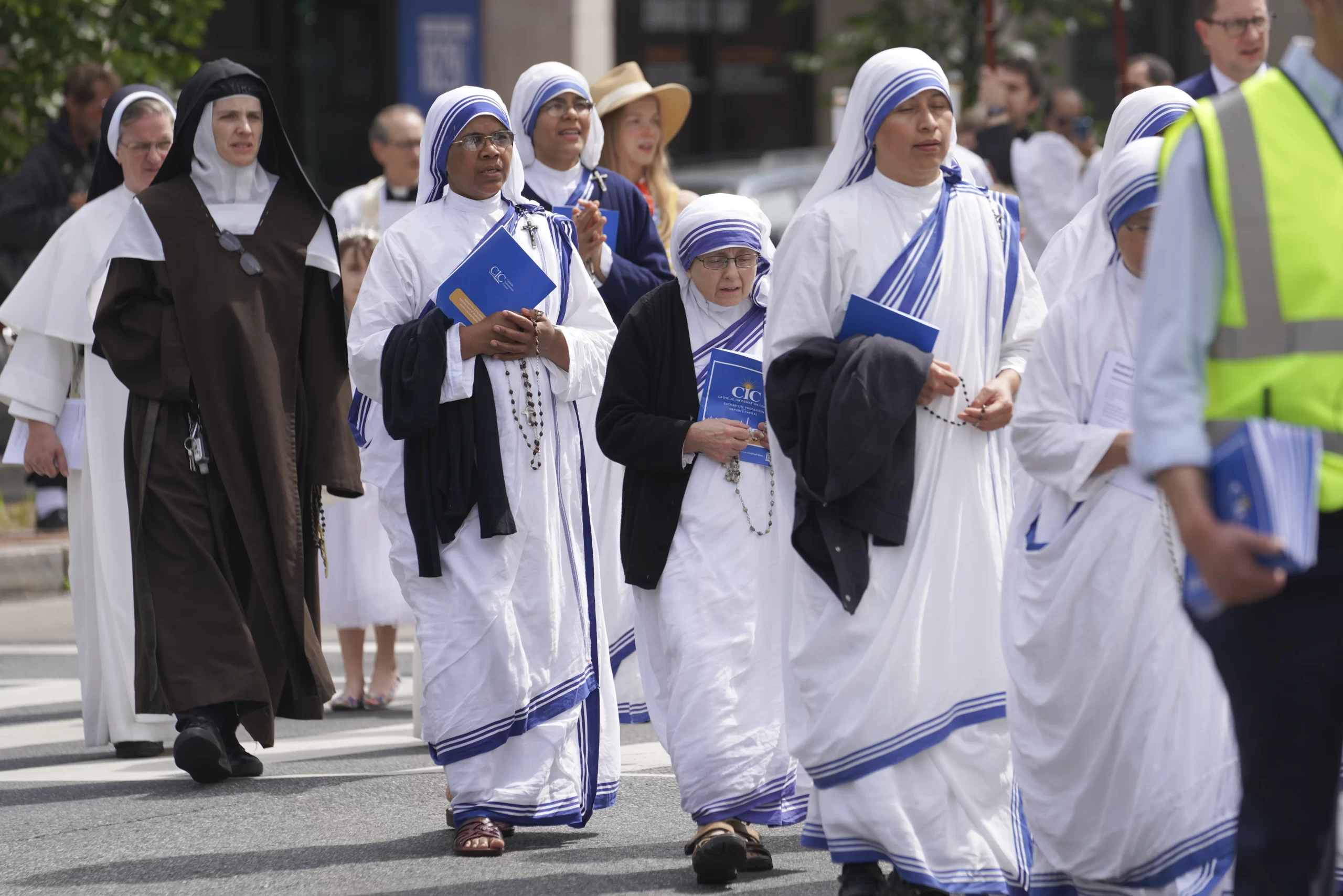 A few hundred Catholics marched through the streets of Washington, D.C., to publicly pray and adore the body of Christ during a eucharistic procession on Saturday, May 20, 2023. Credit: Joe Portolano/CNA