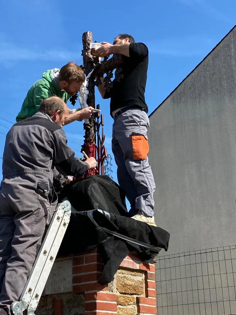 S.O.S. Calvaires, a French lay group, restores a crucifix in France. The group says it aims to restore the artistic and religious heritage of France. Credit: S.O.S. Calvaires/Facebook