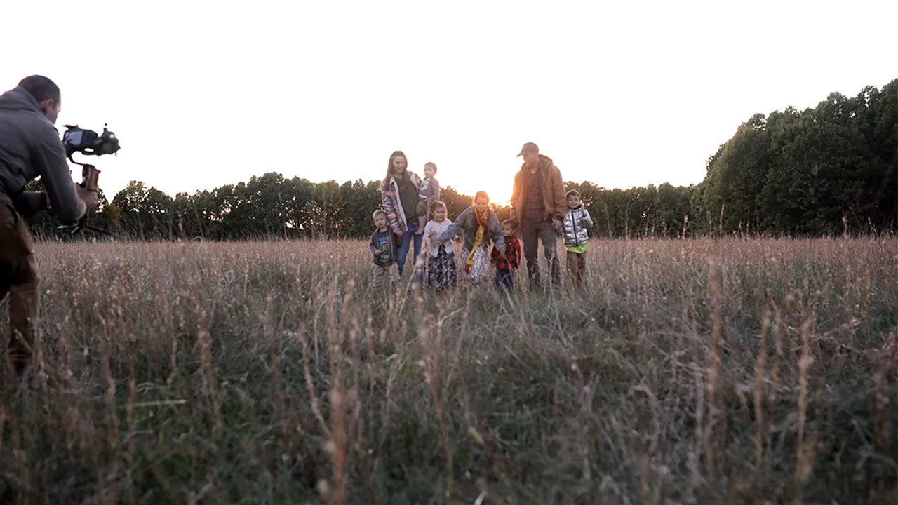 A behind-the-scenes photo of the Darrows filming “The Cultivation of Purpose with Leah Darrow: Faith, Farming and Vocation” on their Missouri farm. UST MAX Studios