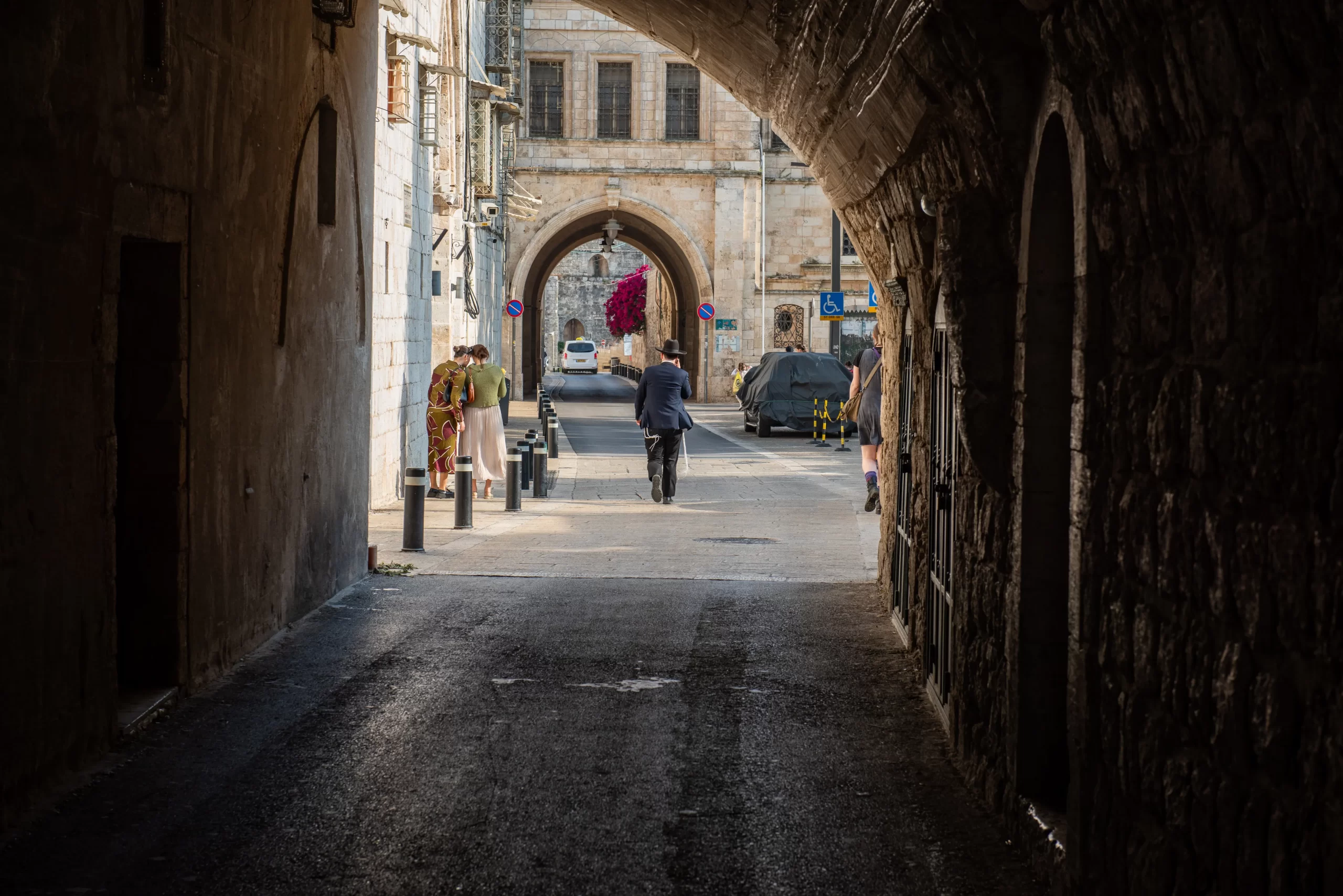 An Orthodox Jew walks past the entrance of the Armenian Patriarchate of Jerusalem, one of the places most affected by anti-Christian violence (both physical and verbal) in April 2024. Credit: Marinella Bandini