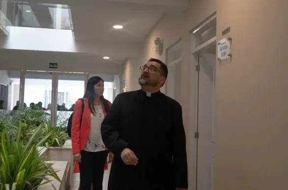 Father Omar Sánchez Portillo walks through the "Sweet Mary" Hospital following its inaugural ceremony. Crédit: Asociación de las Bienaventuranzas (Association of Beatitudes)