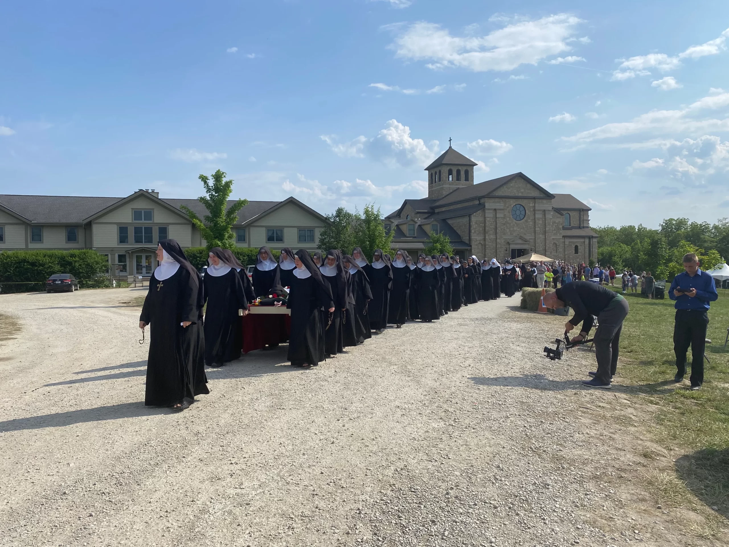 Members of the Benedictines of Mary, Queen of Apostles, lead a procession with the body of their foundress, Sister Wilhelmina Lancaster, at their abbey in Gower, Missouri, on May 29, 2023. Joe Bukuras/CNA