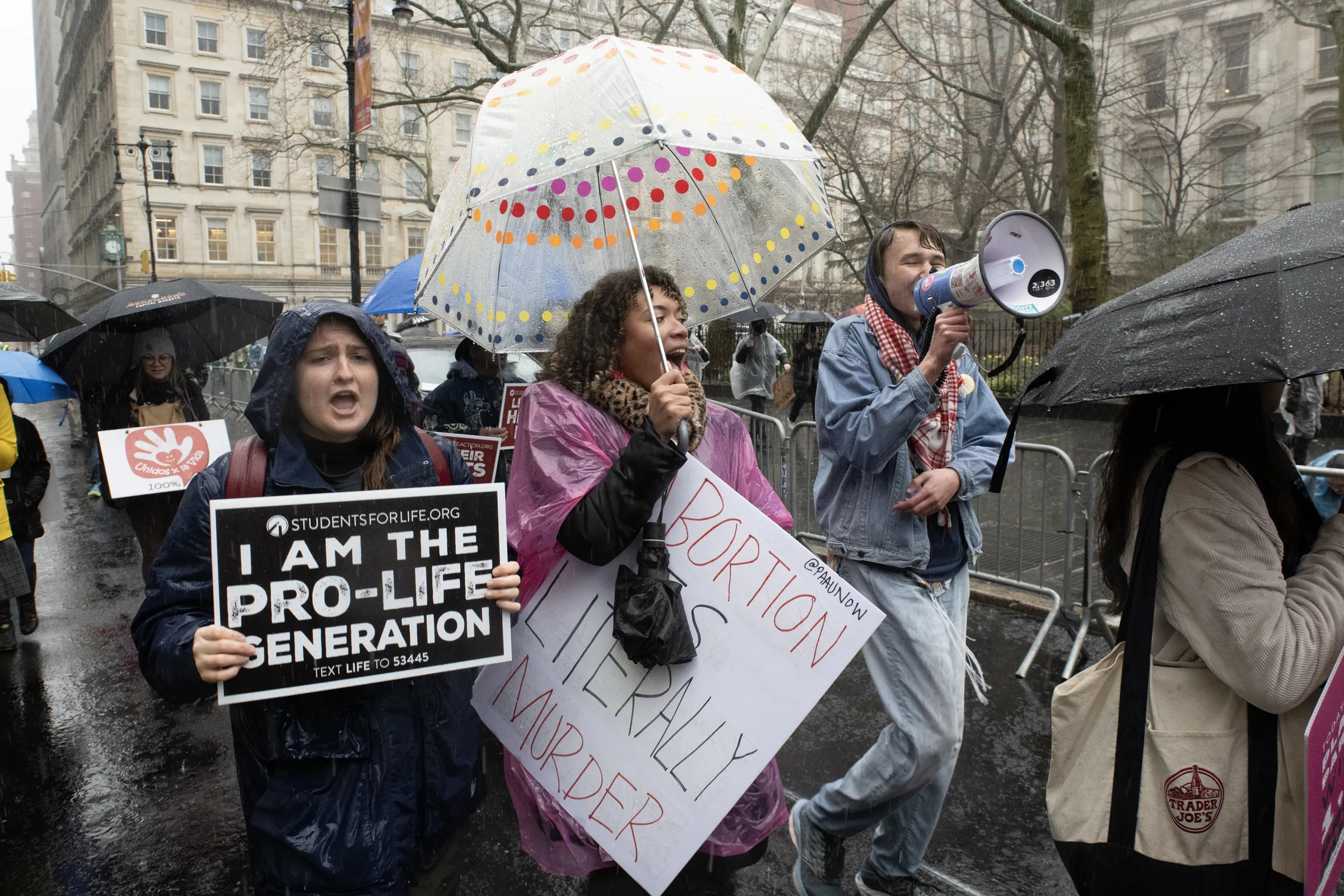 Hundreds of pro-lifers joined the International Gift of Life Walk in lower Manhattan, New York City, despite heavy rain and protestors on March 23, 2024. Credit: Jeffrey Bruno