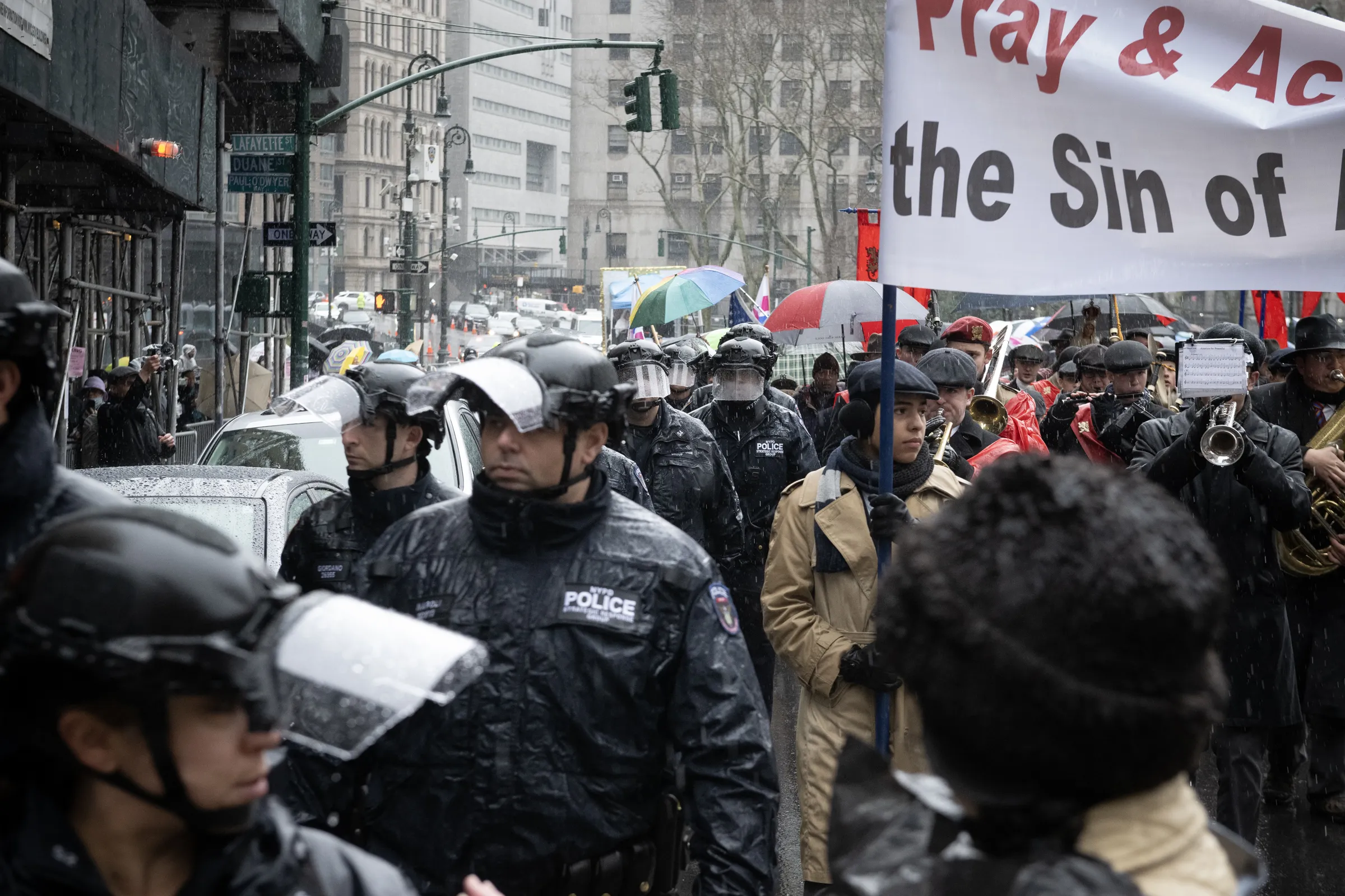 New York Police Department officers escort pro-lifers in the International Gift of Life Walk as pro-abortion protestors heckle and attempt to disrupt the event in lower Manhattan on March 23, 2024. Credit: Jeffrey Bruno