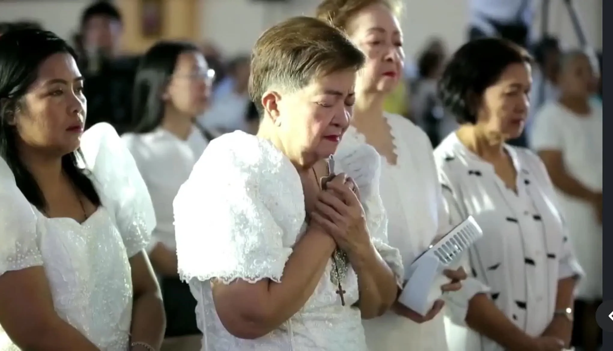 The mother of Servant of God Niña Ruíz-Abad (center) and her sister (left) as well as other relatives were present during the opening session of Ruíz-Abad's canonization cause at the Cathedral of St. William the Hermit in Laoag City, Philippines, on April 7, 2024. Credit: Photo courtesy of the Cenacle of the Most Precious Blood of Jesus