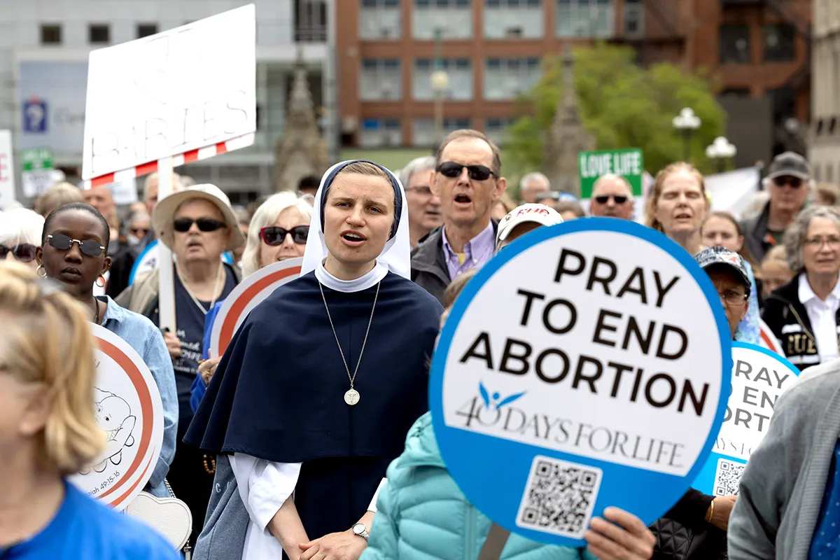 Participants in the Ottawa, Canada, March for Life on May 9, 2024, sing the national anthem. Credit: Peter Stockland