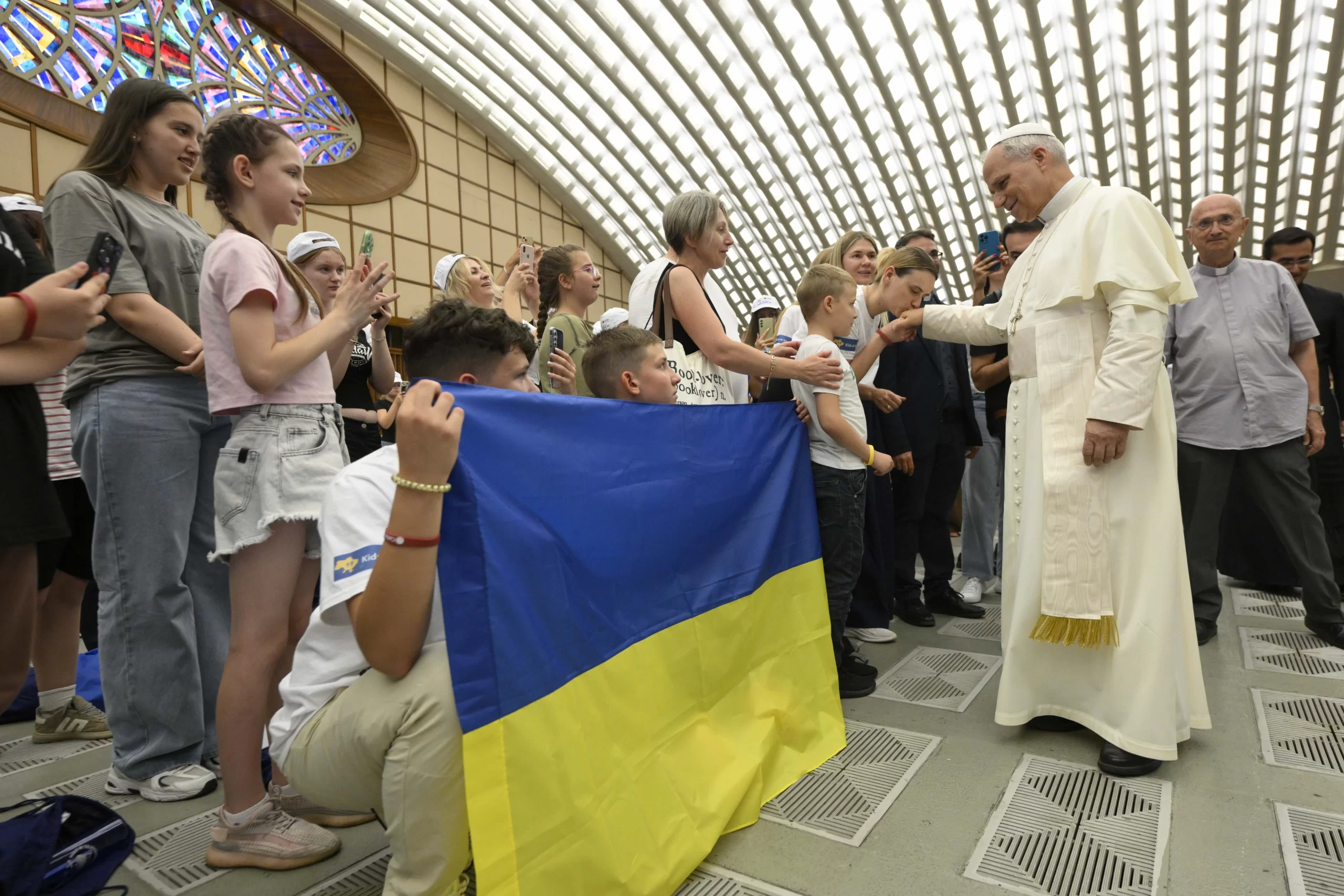 Pope Leo XIV meets with Ukrainian children who were welcomed by Caritas Italy during the summer on July 3, 2025, at the Vatican. Credit: Vatican Media