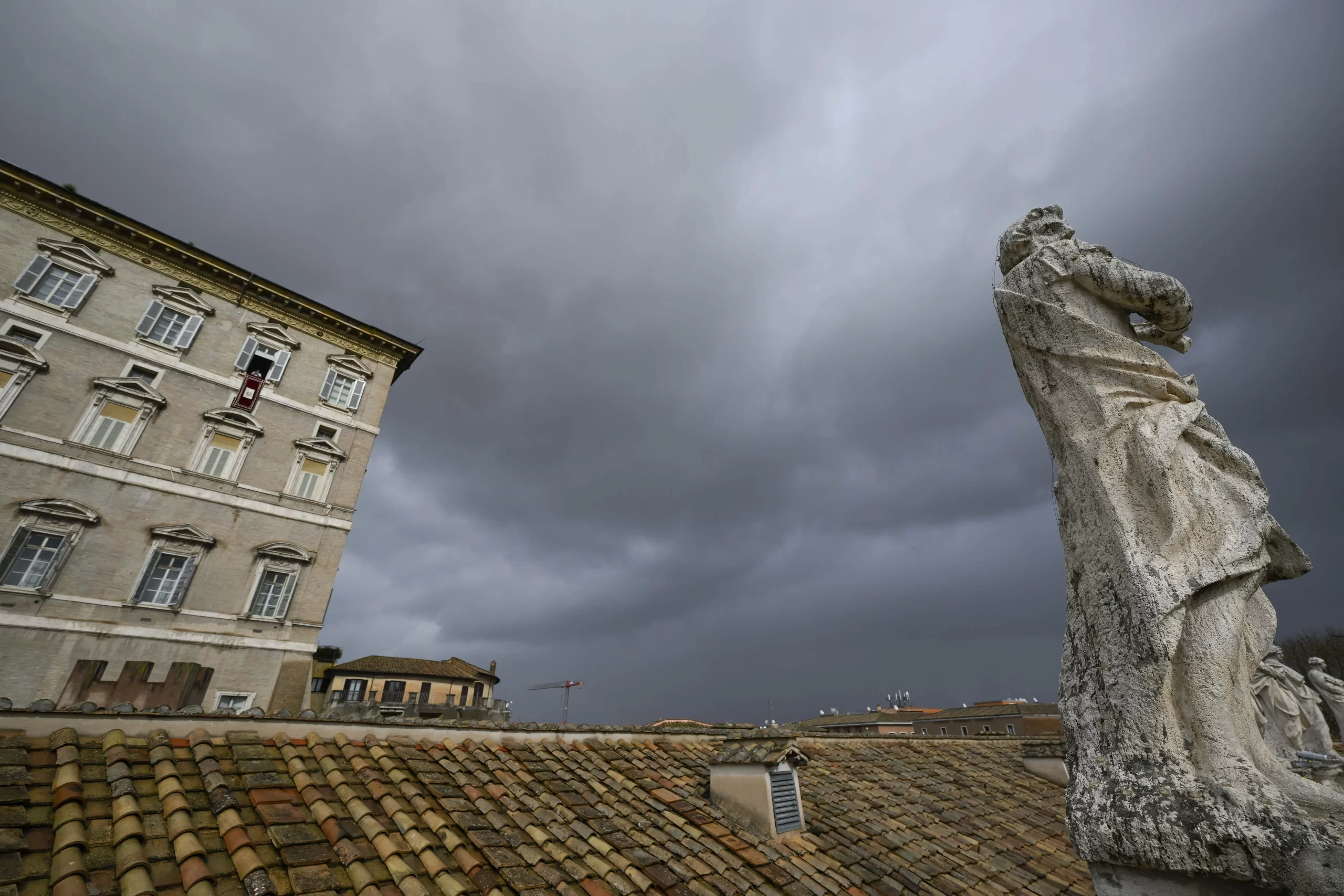 Pope Francis speaks from the window of the Apostolic Palace on a rainy Sunday in Rome on Feb. 11, 2024. Vatican Media