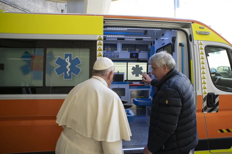 Pope Francis and Cardinal Konrad Krajewski with an ambulance bound for Ukraine. Vatican Media.
