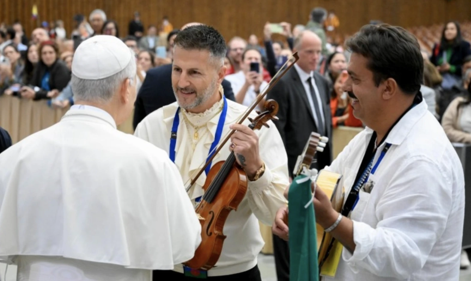 Pope Leo XIV greets musicians participating in the Jubilee of Roma, Sinti, and Travelers in the Vatican's Paul VI Hall on Saturday, Oct. 18, 2025. Credit: Vatican Media