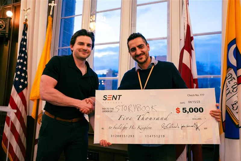 Francisco Cornejo of Storybook is awarded the grand prize at “Catholic Shark Tank.”. Credit: Courtesy photo/SENT