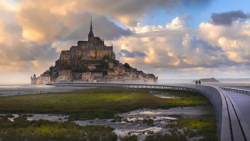 The leading walkway to Le Mont-Saint-Michel in Normandy, France. Credit: Tsomchat/Shutterstock