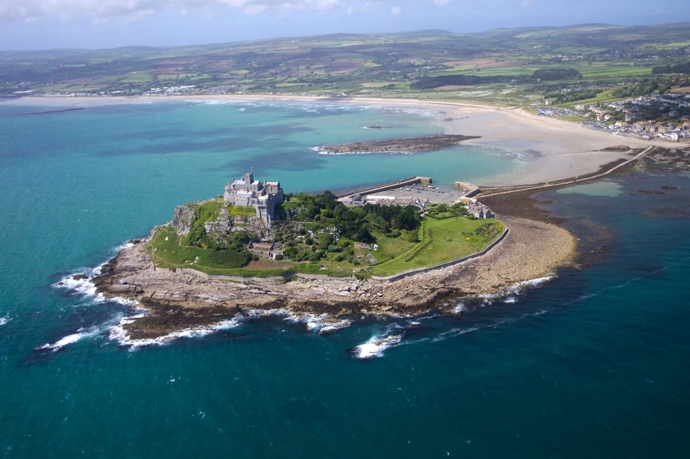 An aerial view of St. Michael’s Mount, Penzance, Lands End Peninsula, West Penwith, Cornwall, England, United Kingdom. Credit: Robert Harding Video/Shutterstock
