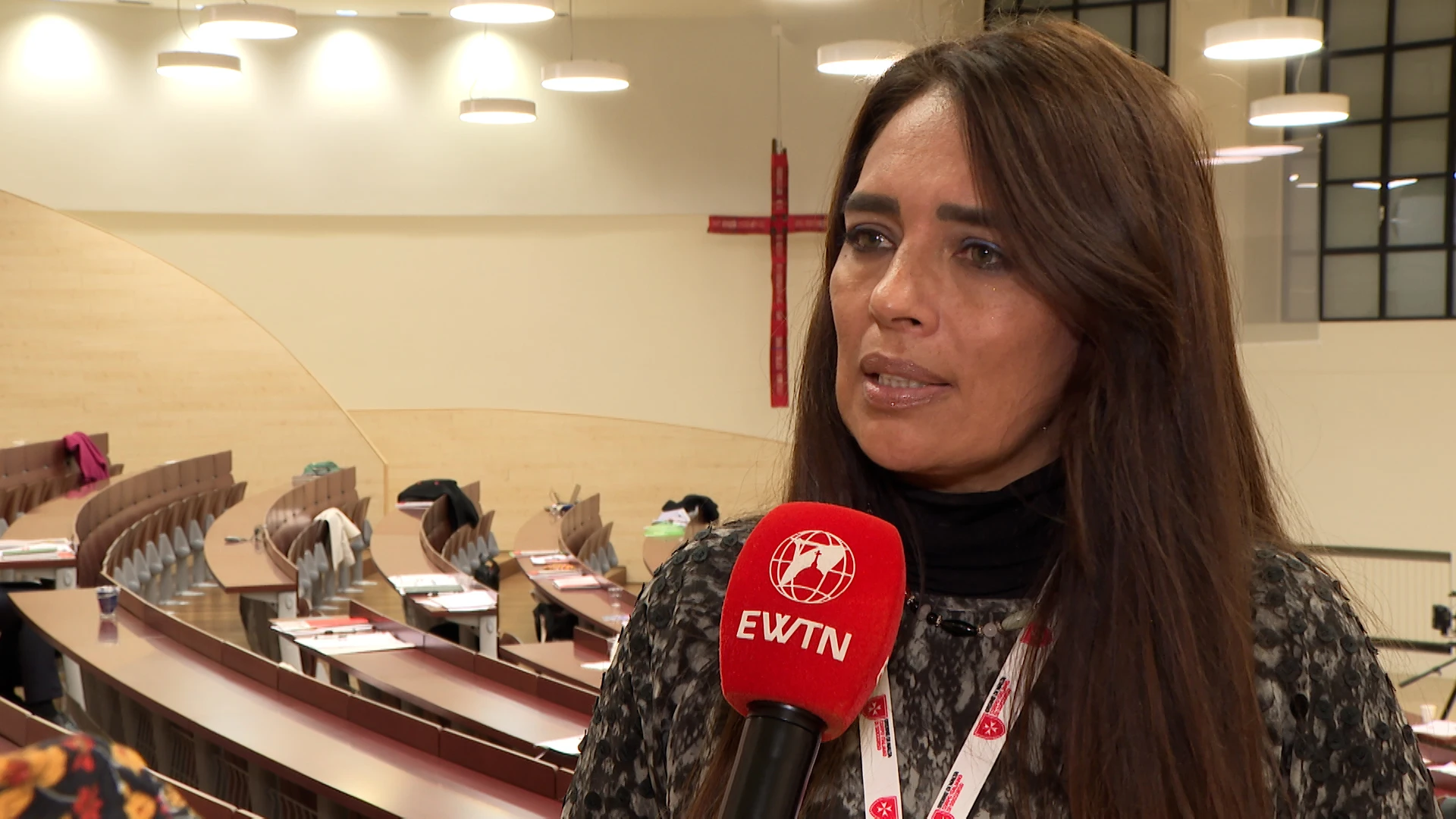 Karla De la Cuesta, a survivor of human trafficking and now an activist and lawyer, spoke at an international conference in Rome at the Pontifical Gregorian University to discuss trafficking prevention efforts Dec. 11, 2025. Credit: Screenshot from EWTN TV video footage